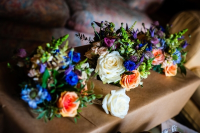 Apricot, blue, purple and ivory bouquets
